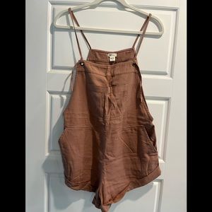 Billabong overalls in a blushing rose color.